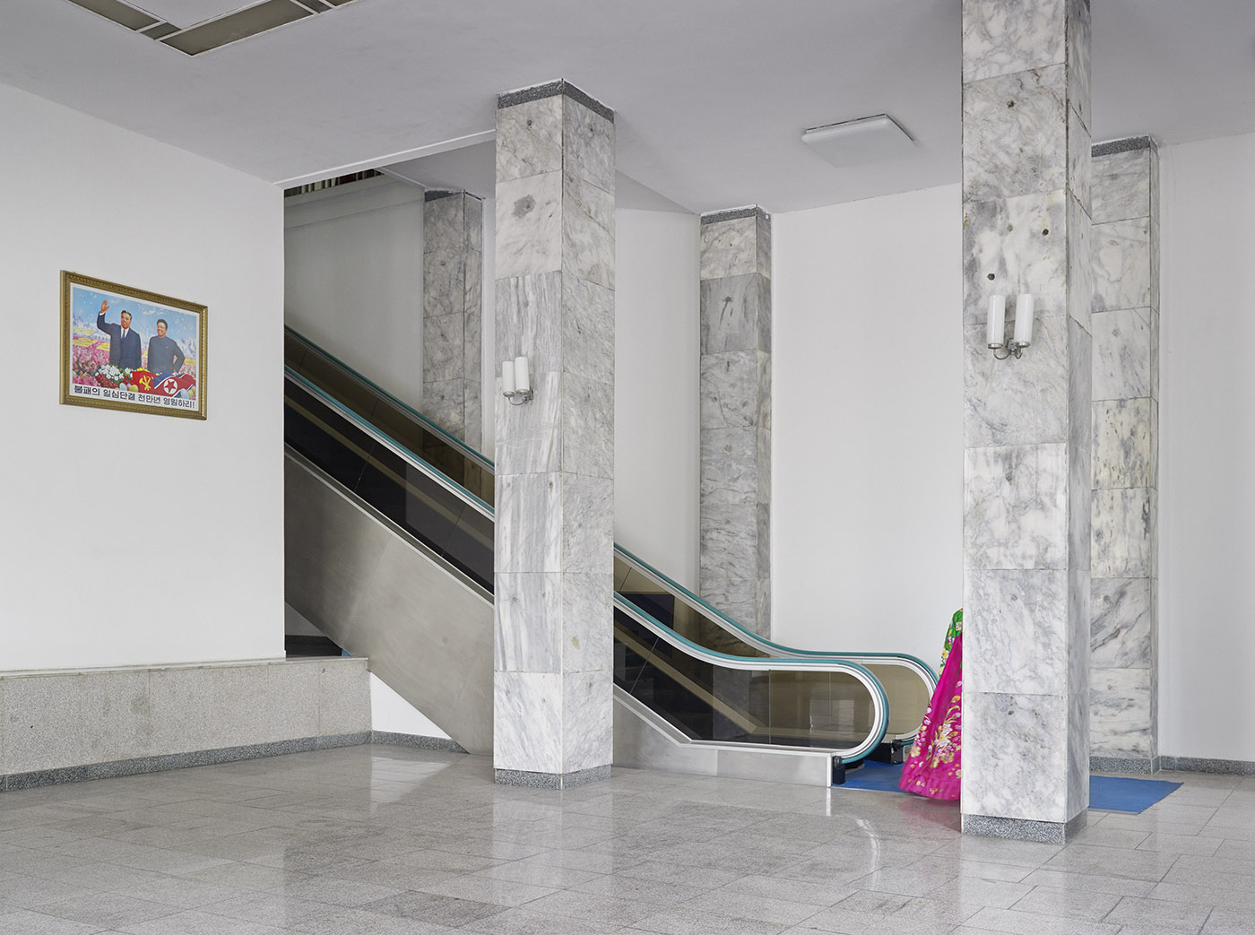 The entrance to Kim Il sung stadium. The marble pillars and expansive lobby are typical of the neoclassical style seen throughout Pyongyang