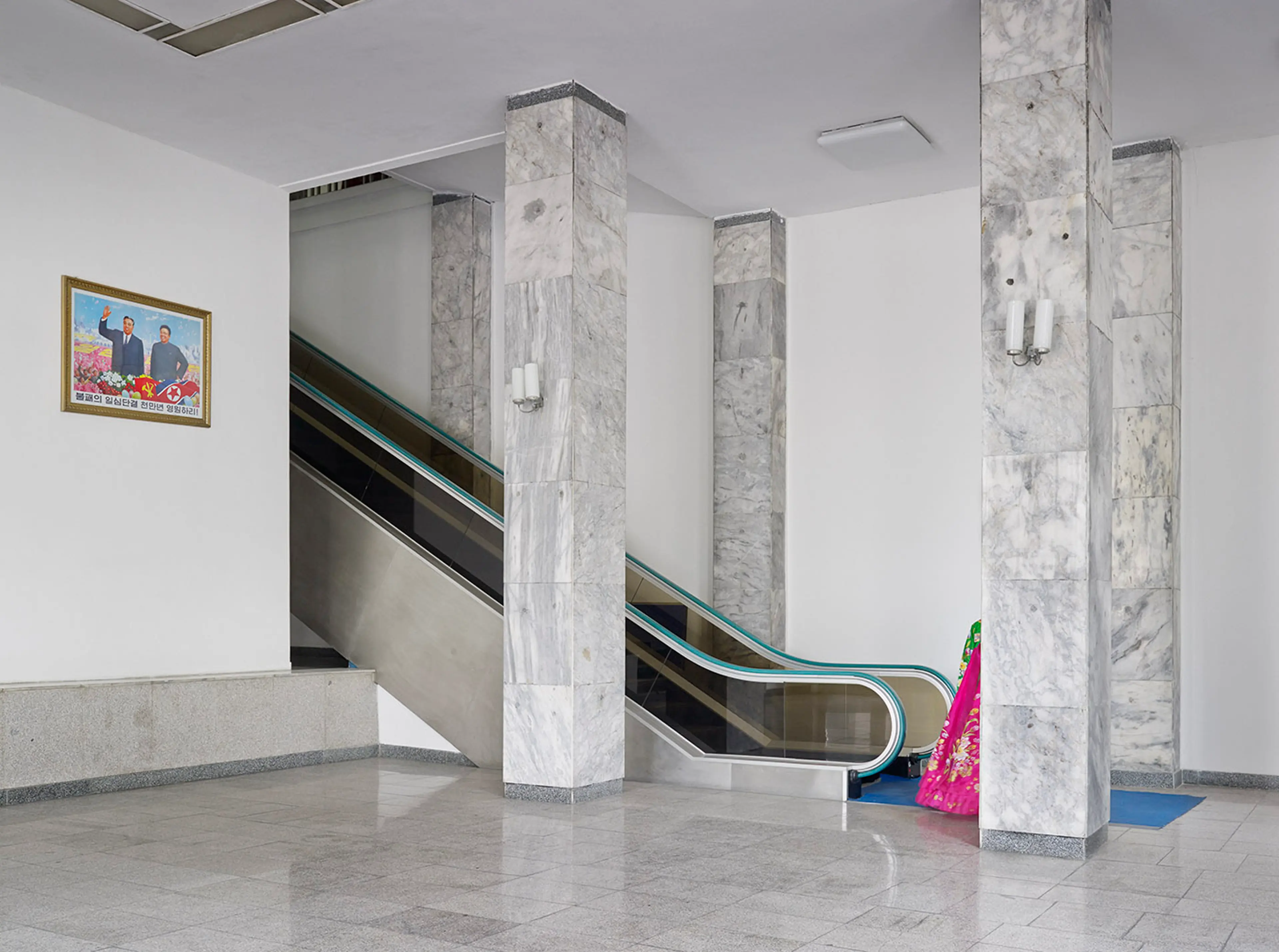 The entrance to Kim Il sung stadium. The marble pillars and expansive lobby are typical of the neoclassical style seen throughout Pyongyang