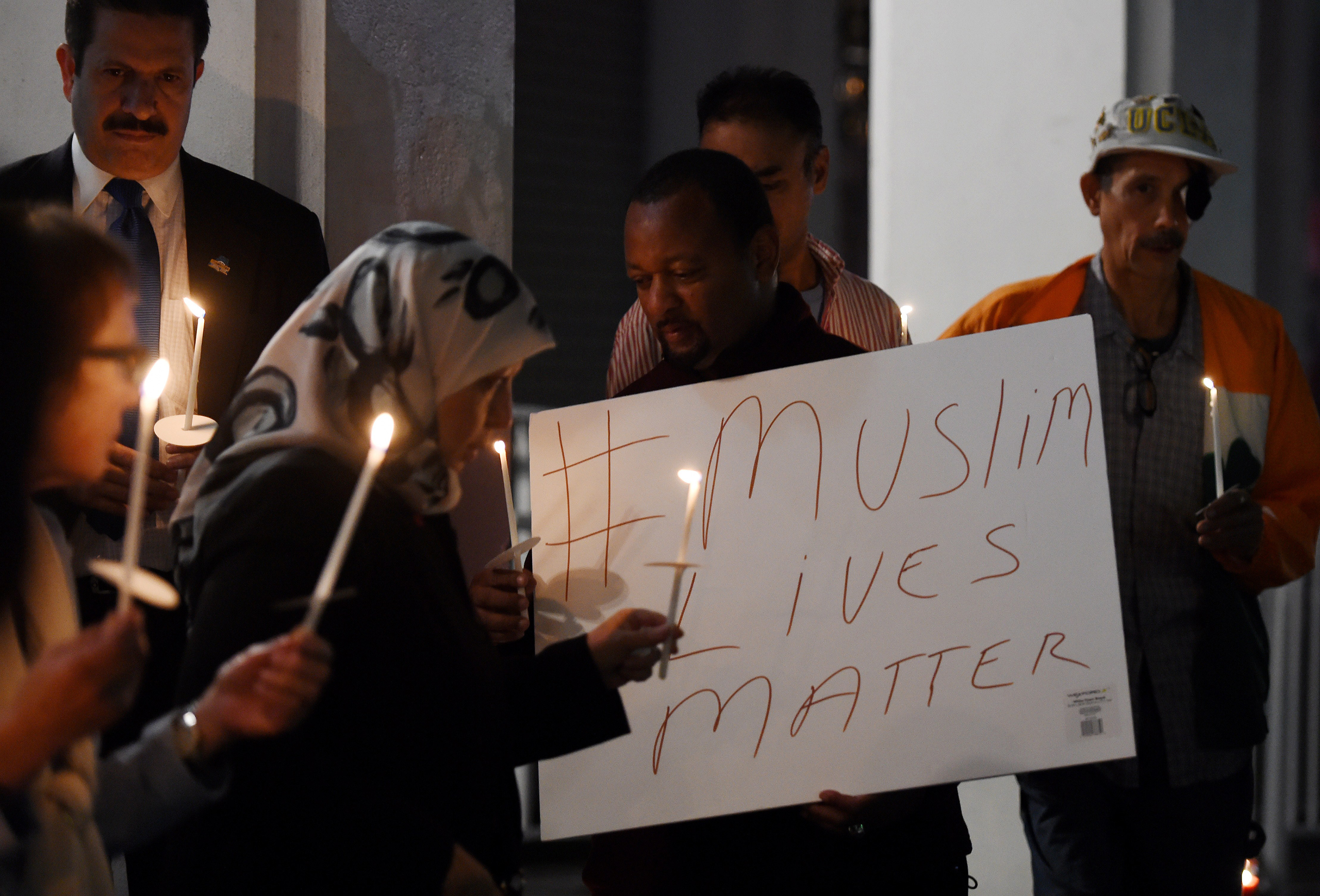 Muslims hold a candlelight vigil at the Islamic Center of Southern California in Los Angeles on Feb. 12, 2015.