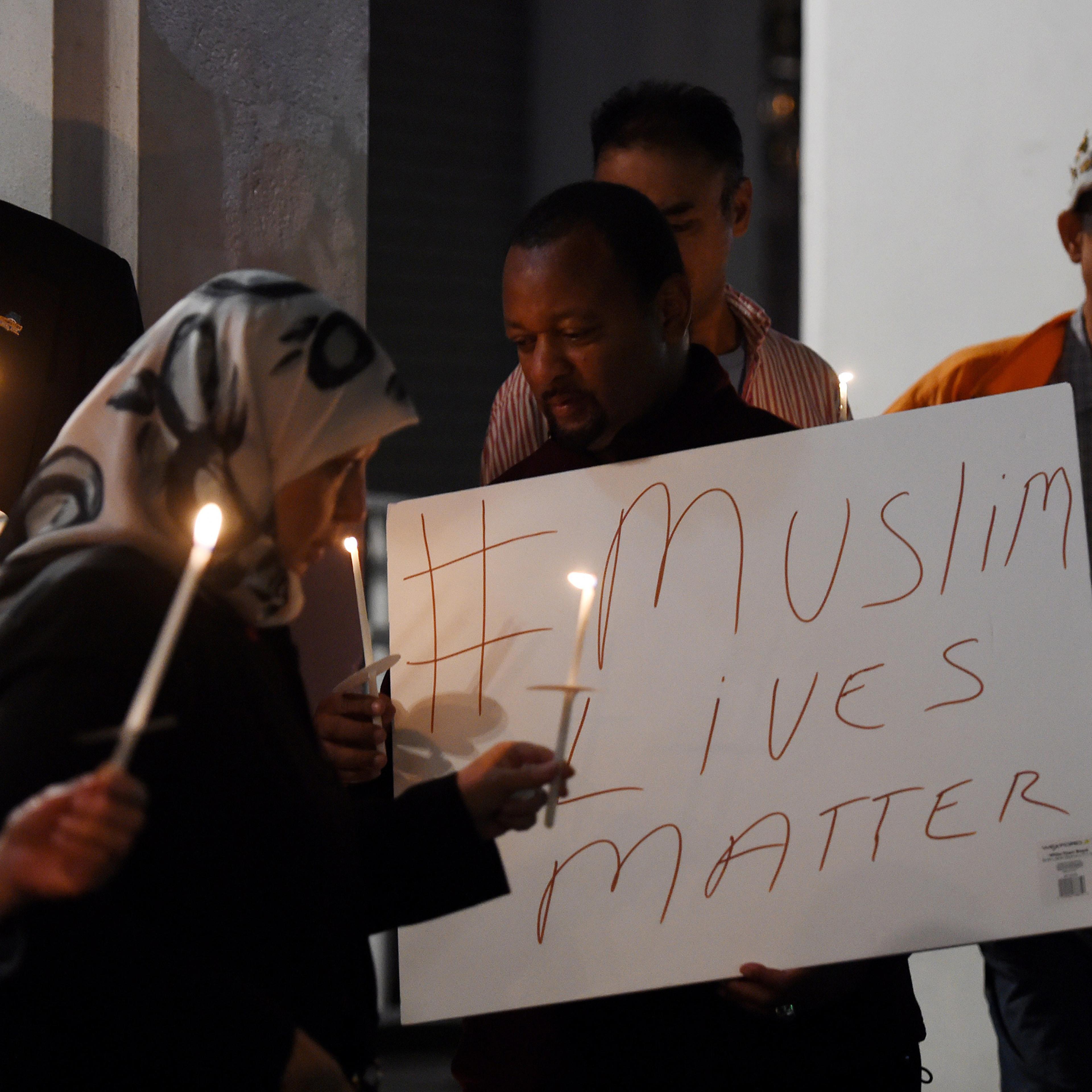 Muslims hold a candlelight vigil at the Islamic Center of Southern California in Los Angeles on Feb. 12, 2015.