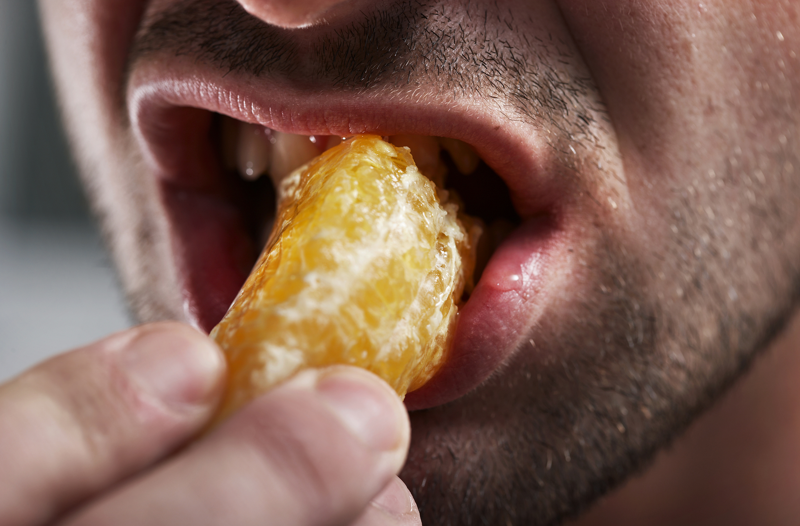 Man eating fruit