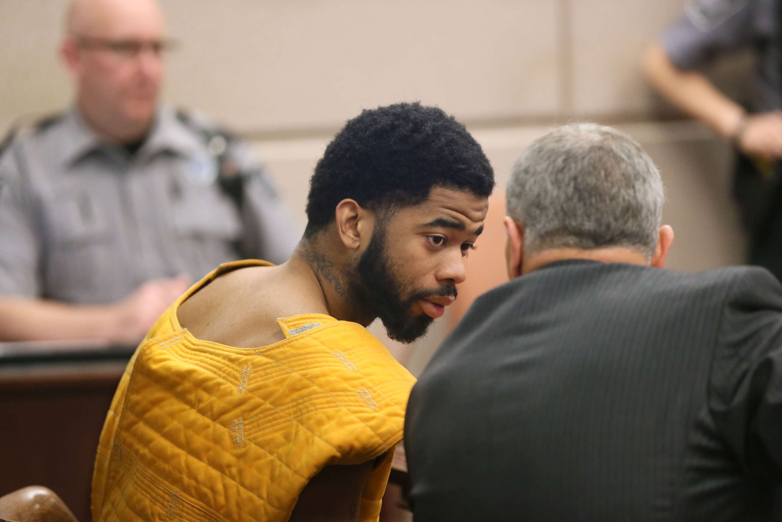 Dominique Heaggan-Brown appears in Milwaukee County Circuit Court, Wednesday, Oct. 26, 2016 in Milwaukee. Heaggan-Brown a Milwaukee police officer whose fatal shooting of a black man sparked a weekend of violent unrest in the city has been ordered to sta