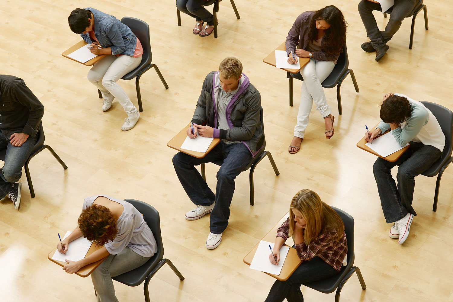 College students taking test in classroom