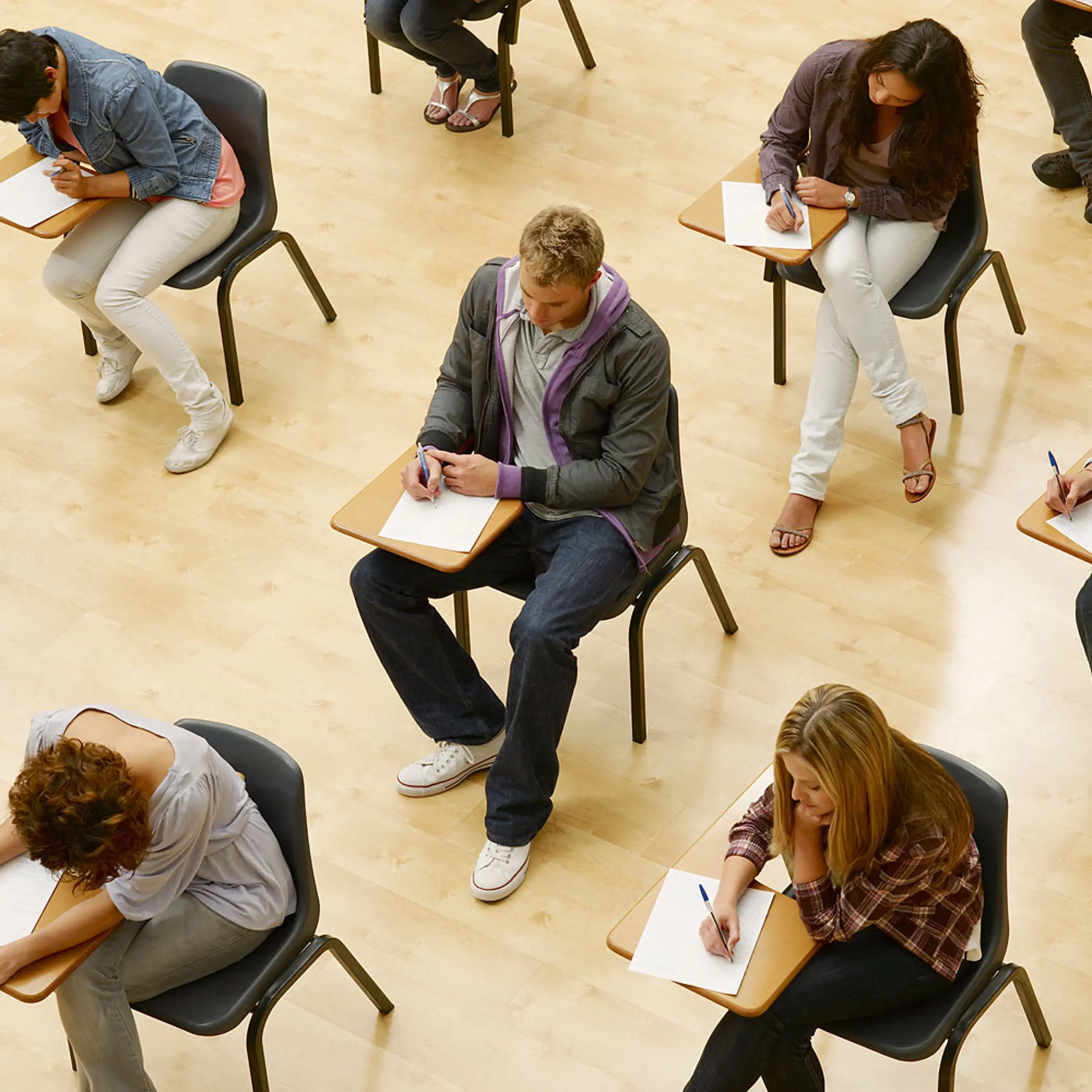 College students taking test in classroom