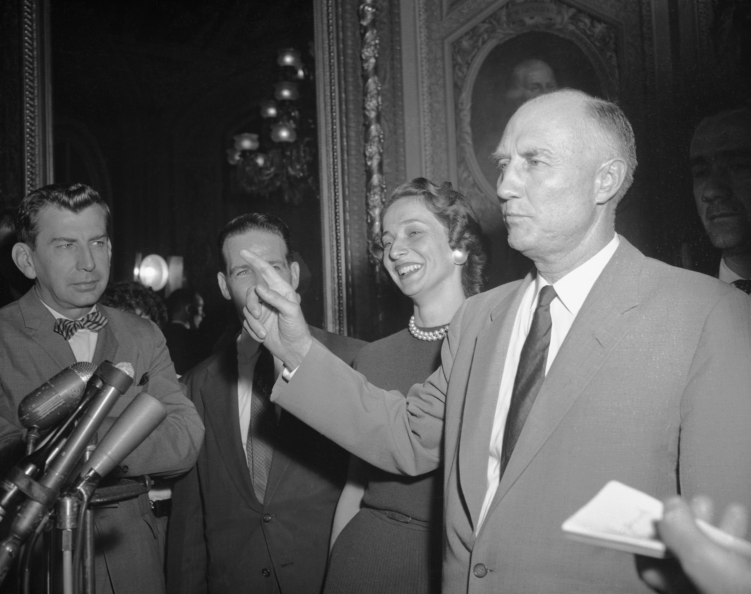 Sen. Strom Thurmond speaks with reporters after ending the longest filibuster on record — a 24-hour, 18-minute talkathon against the Civil Rights Act of 1957 in the Senate Chamber — Washington, D.C. on Aug. 29, 1957.