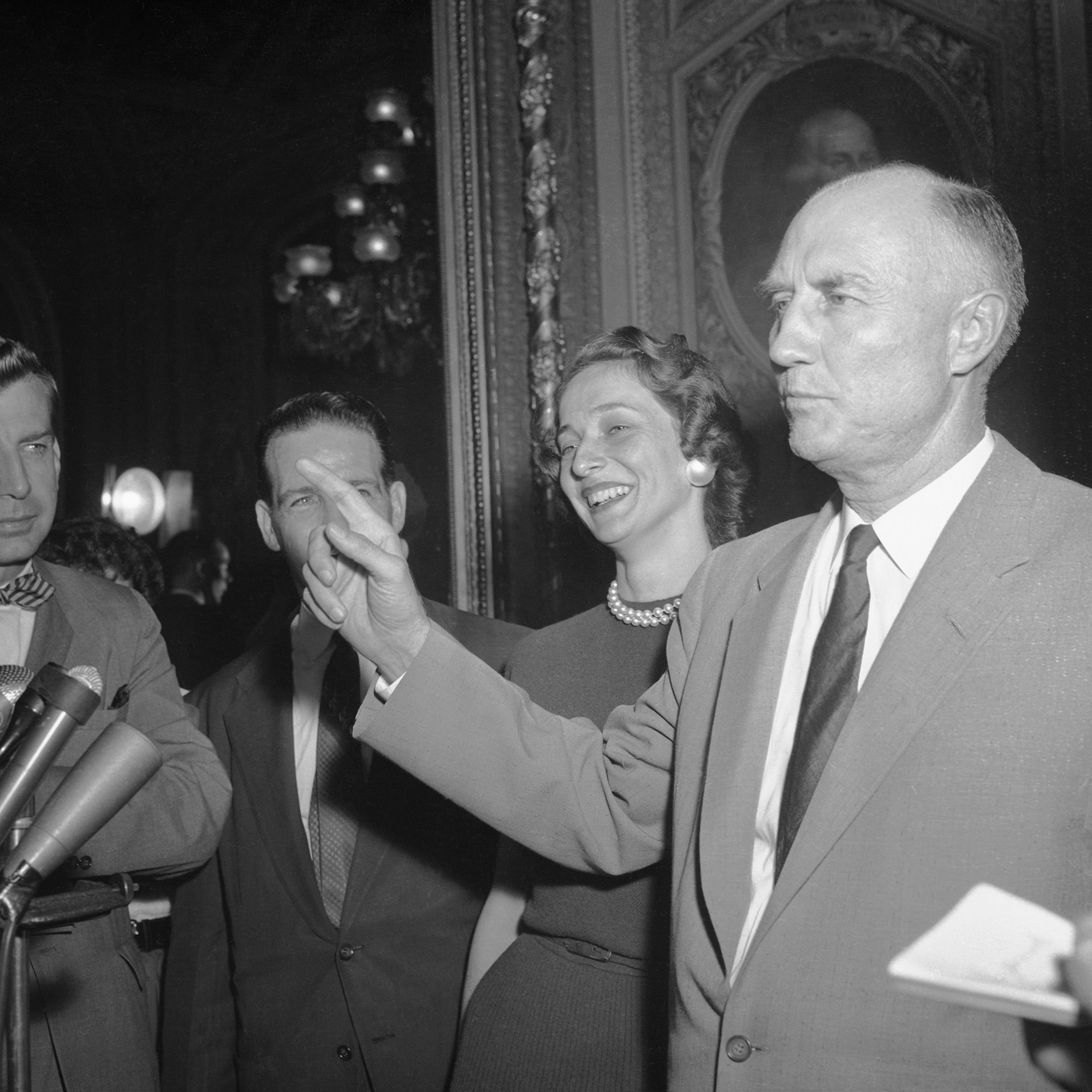 Sen. Strom Thurmond speaks with reporters after ending the longest filibuster on record — a 24-hour, 18-minute talkathon against the Civil Rights Act of 1957 in the Senate Chamber — Washington, D.C. on Aug. 29, 1957.