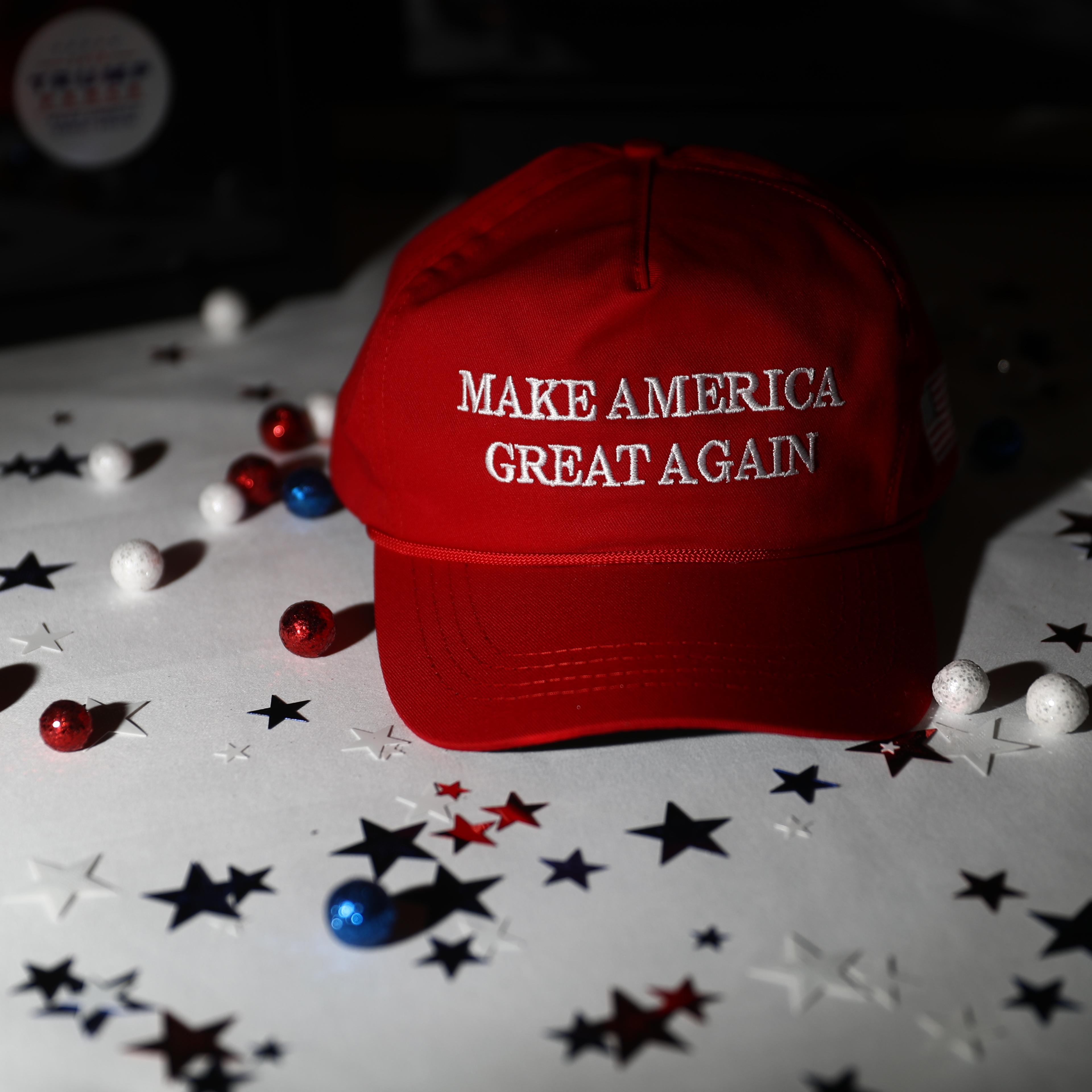 A "Make America Great Again" hat sits on a table ahead of an election night party for 2016 Republican Presidential Nominee Donald Trump at the Hilton Midtown hotel in New York on Nov. 8, 2016.