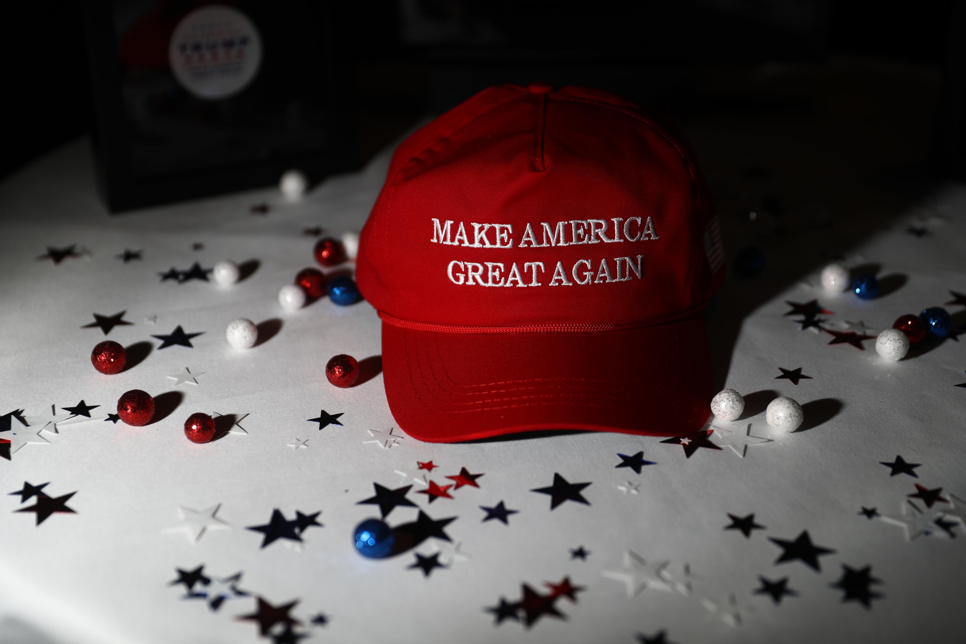 A "Make America Great Again" hat sits on a table ahead of an election night party for 2016 Republican Presidential Nominee Donald Trump at the Hilton Midtown hotel in New York on Nov. 8, 2016.