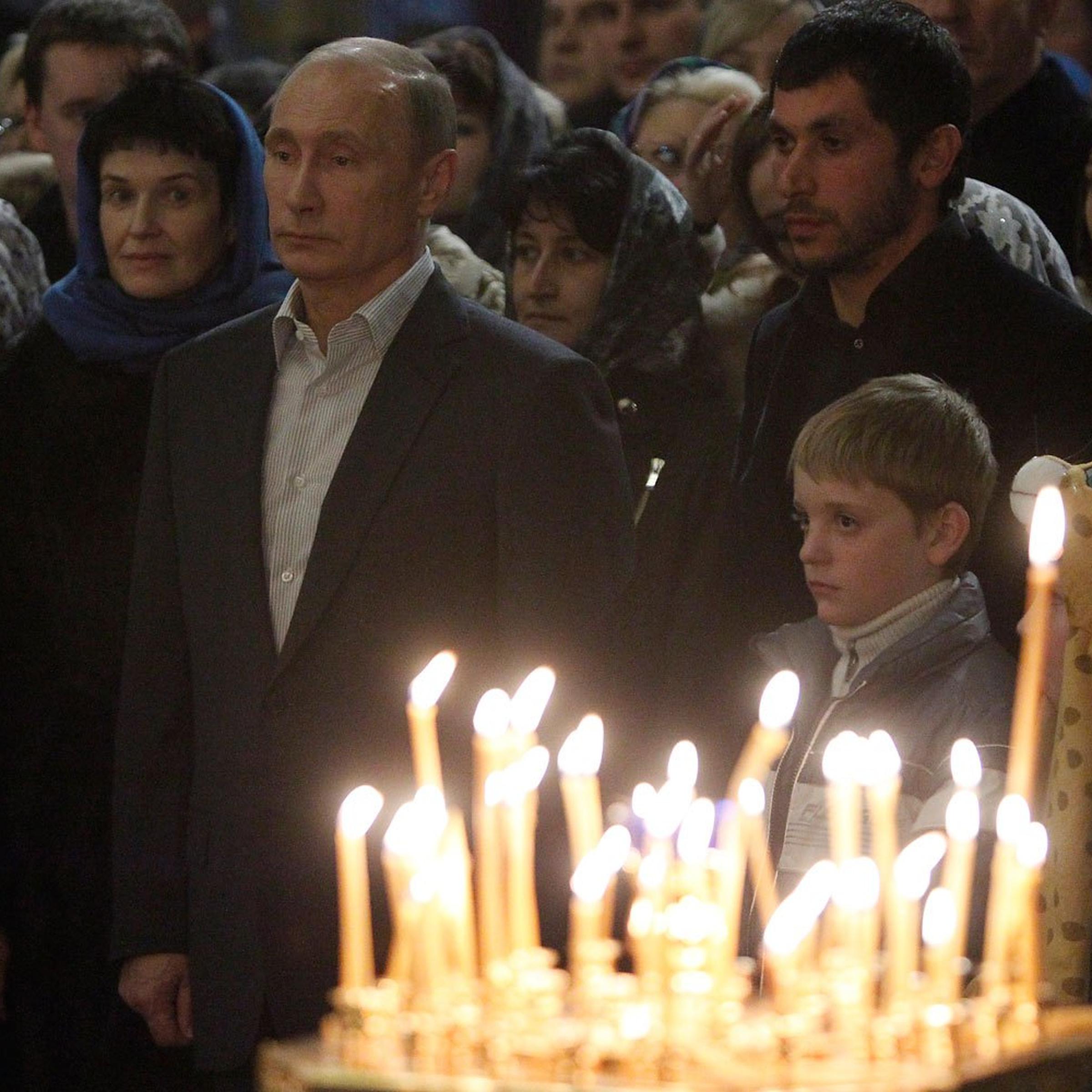 Russia's President Vladimir Putin attends the Orthodox Christmas service at the Cathedral of the Holy Face of Christ the Savior in the Russian city of Sochi on Jan. 7, 2014.