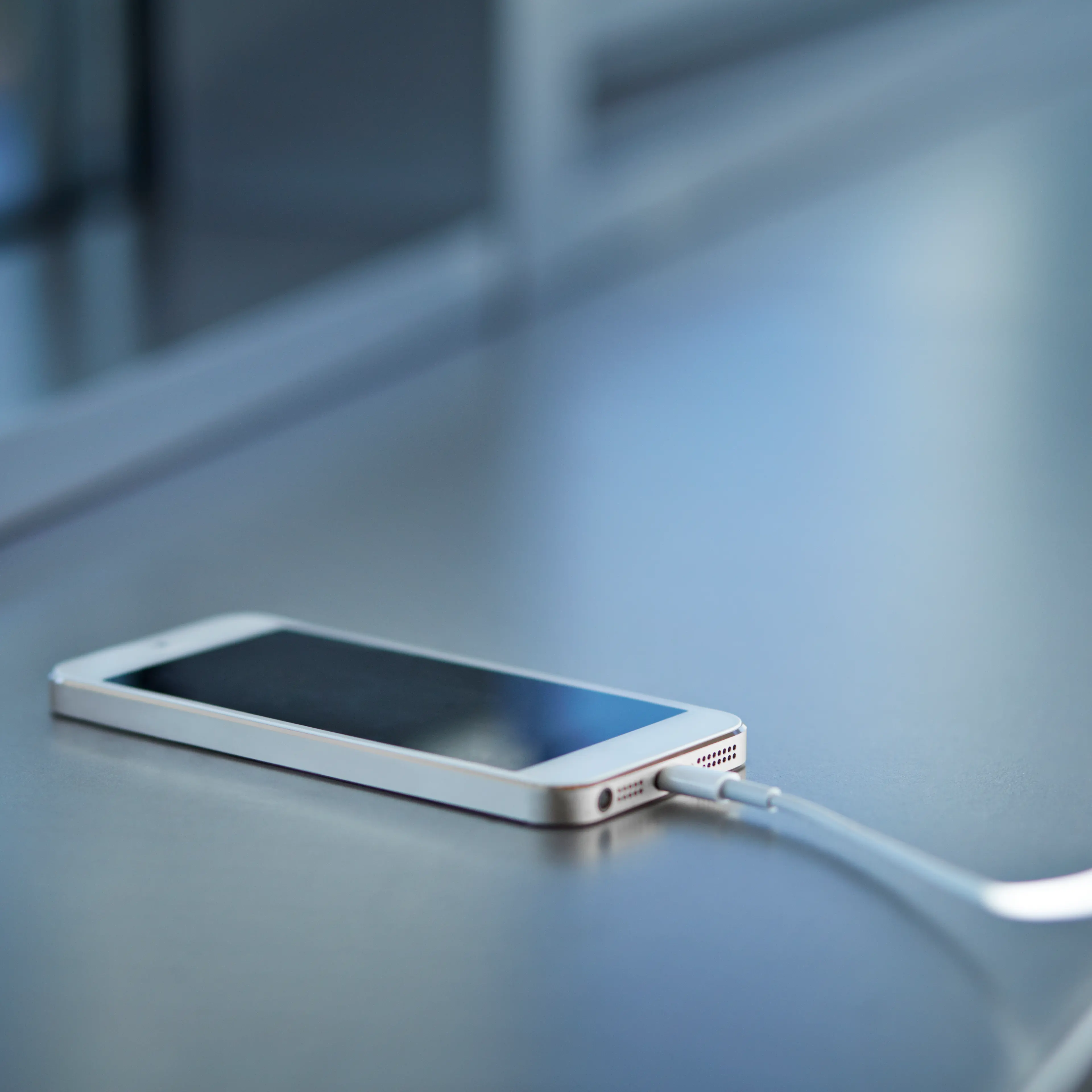 Close-up of smartphone charging