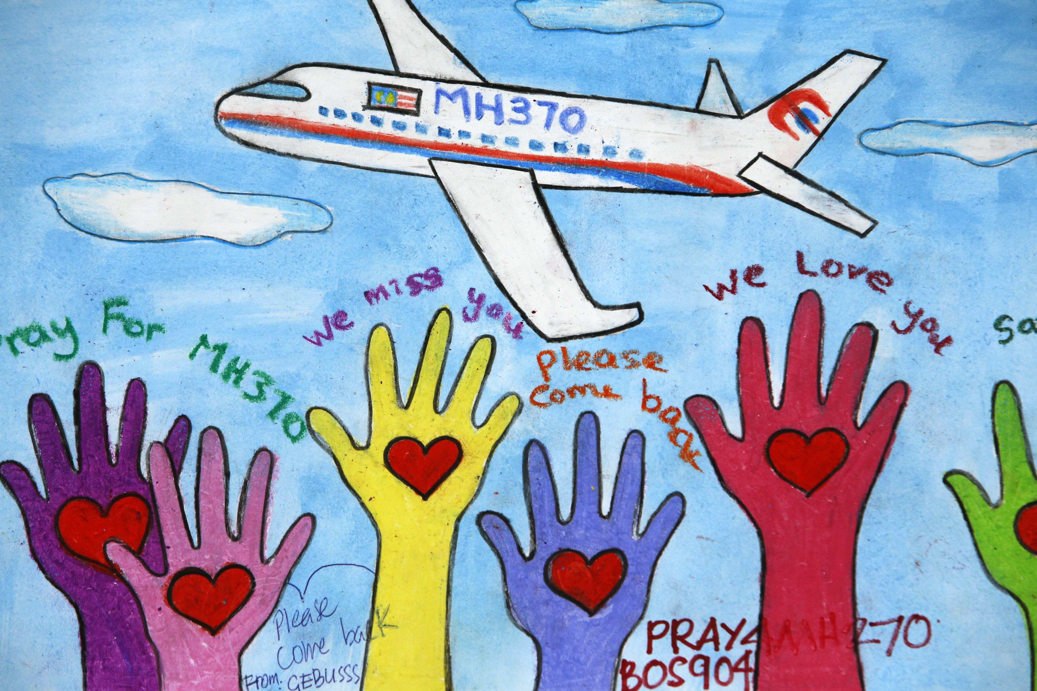 An artwork conveying well-wishes for the missing Malaysia Airlines Flight MH370 is seen in Kuala Lumpur International Airport