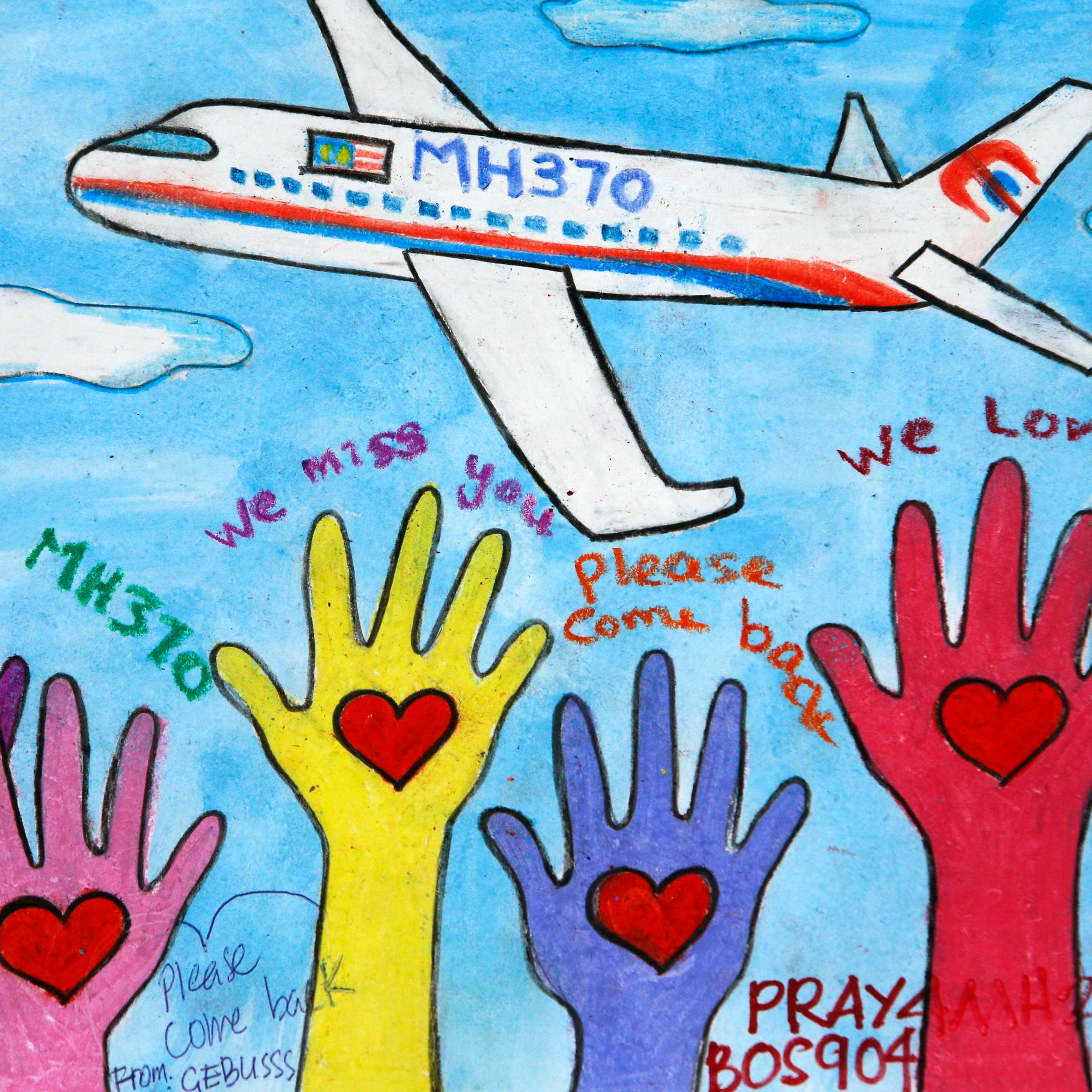 An artwork conveying well-wishes for the missing Malaysia Airlines Flight MH370 is seen in Kuala Lumpur International Airport
