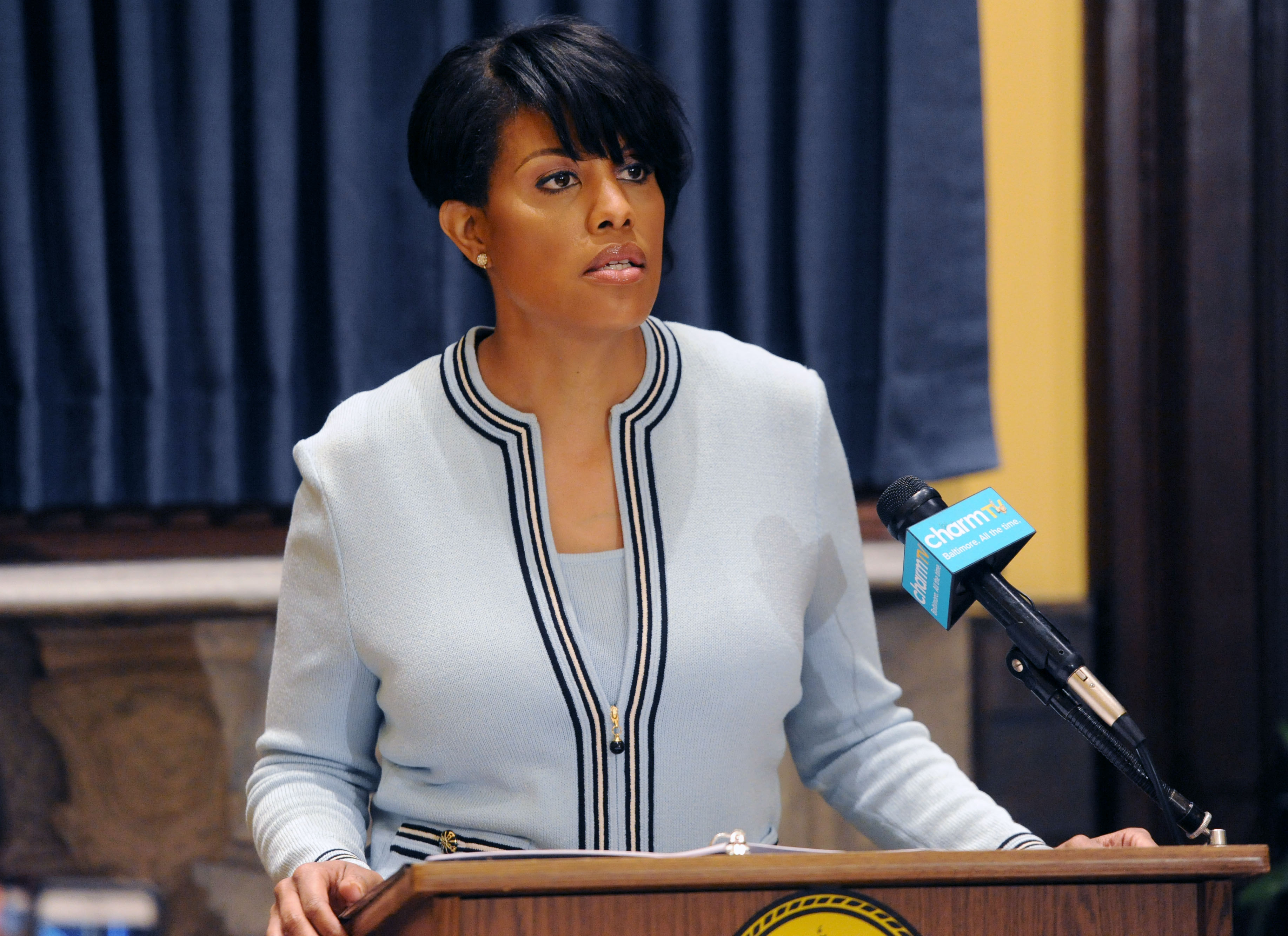 Mayor Stephanie Rawlings-Blake holds a news conference on Wednesday, May 6, 2015 in Baltimore.  The mayor called on U.S. government investigators to look into whether this city's beleaguered police department uses a pattern of excessive force or discrimi