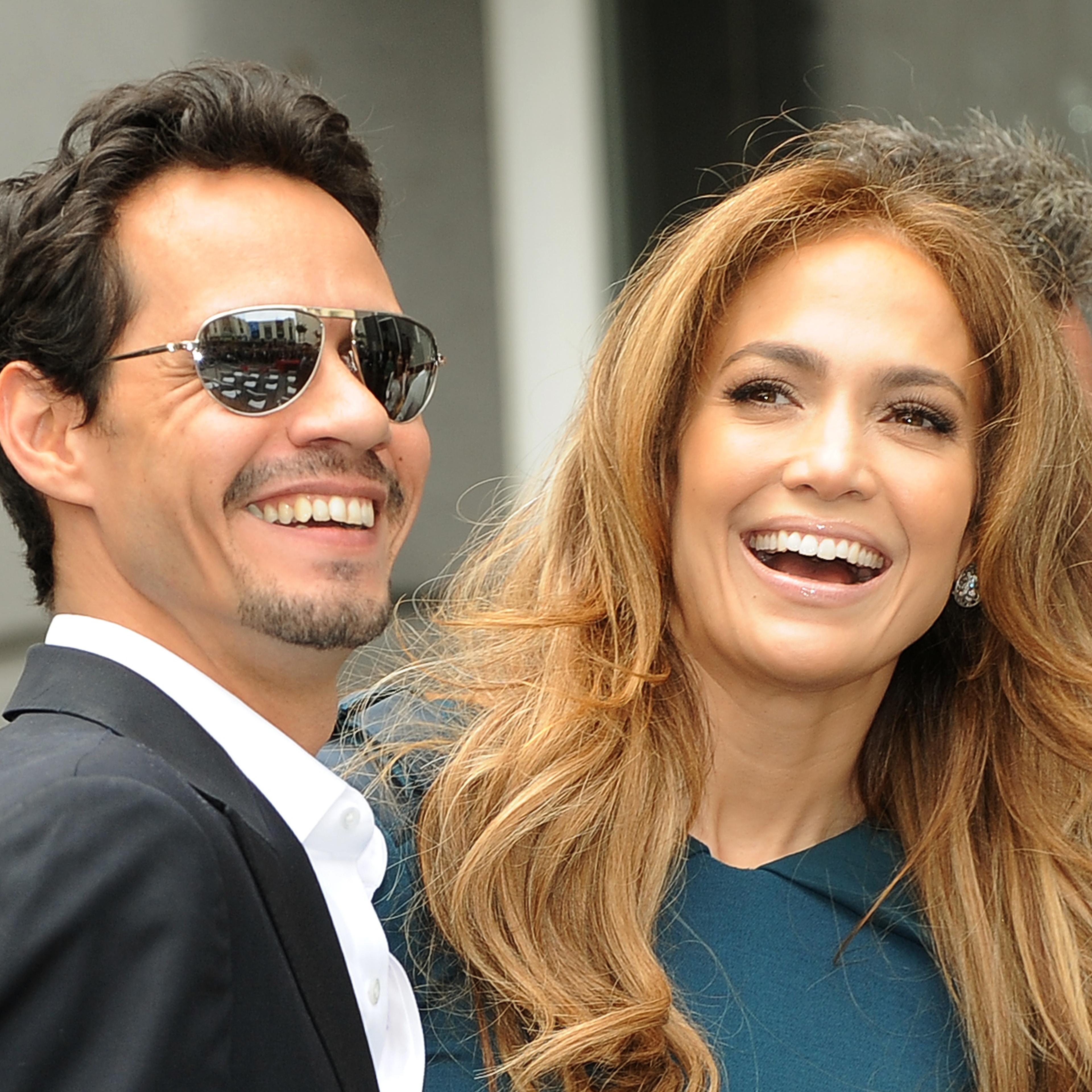 Singer Mark Anthony and his wife singer/