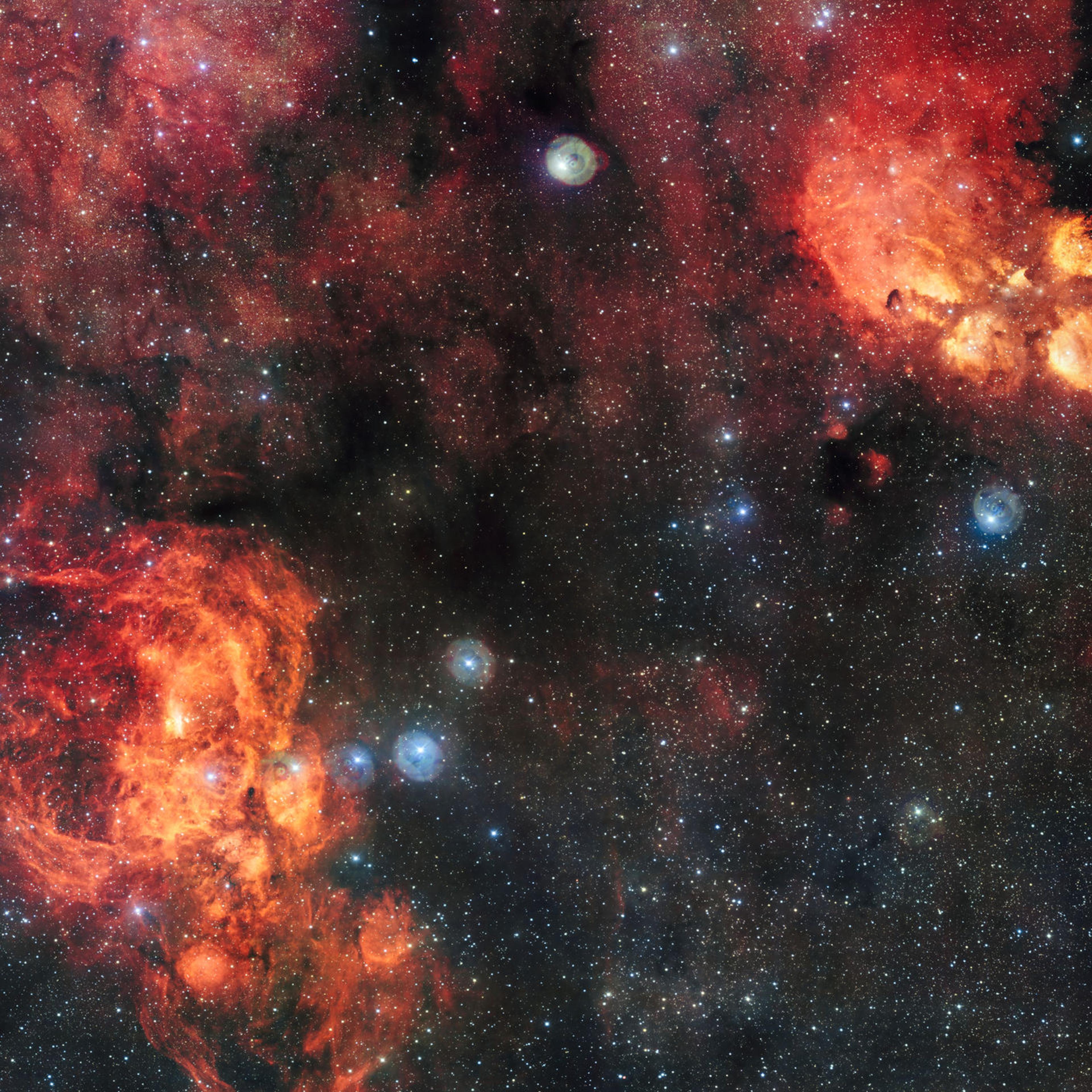 This image, taken from the VLT Survey Telescope, shows the Cat's Paw Nebula (right) and the Lobster Nebula (left).