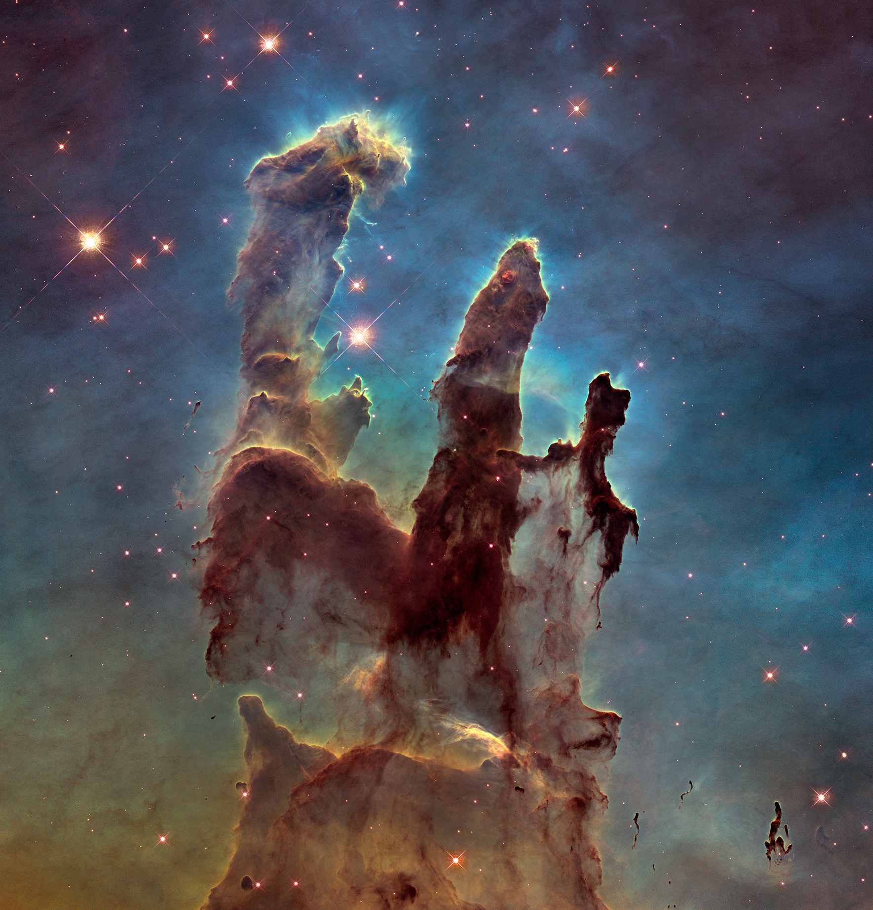 Using NASA's Hubble Space Telescope astronomers have assembled a bigger and sharper photograph of the iconic Eagle Nebula's "Pillars of Creation"
