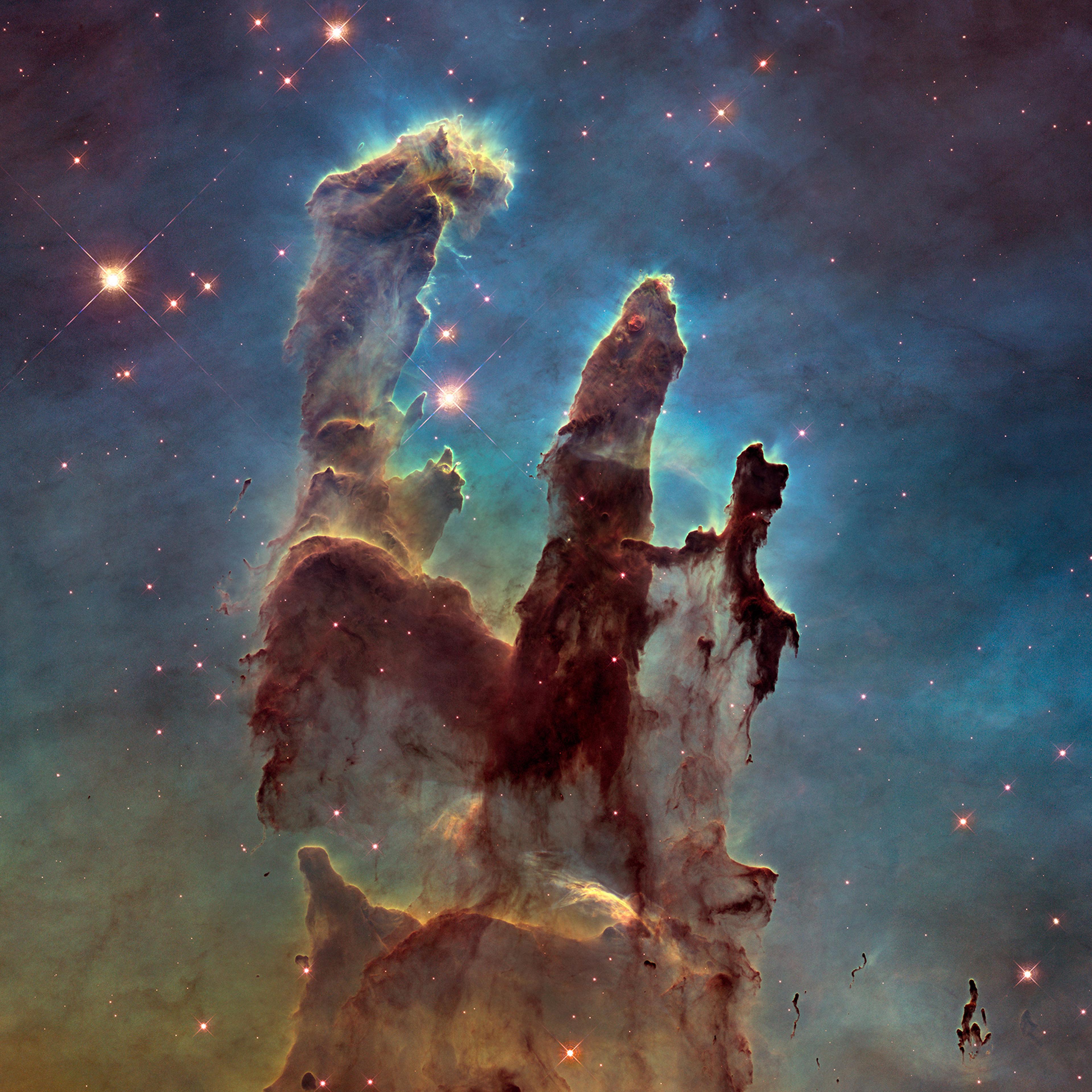Using NASA's Hubble Space Telescope astronomers have assembled a bigger and sharper photograph of the iconic Eagle Nebula's "Pillars of Creation"