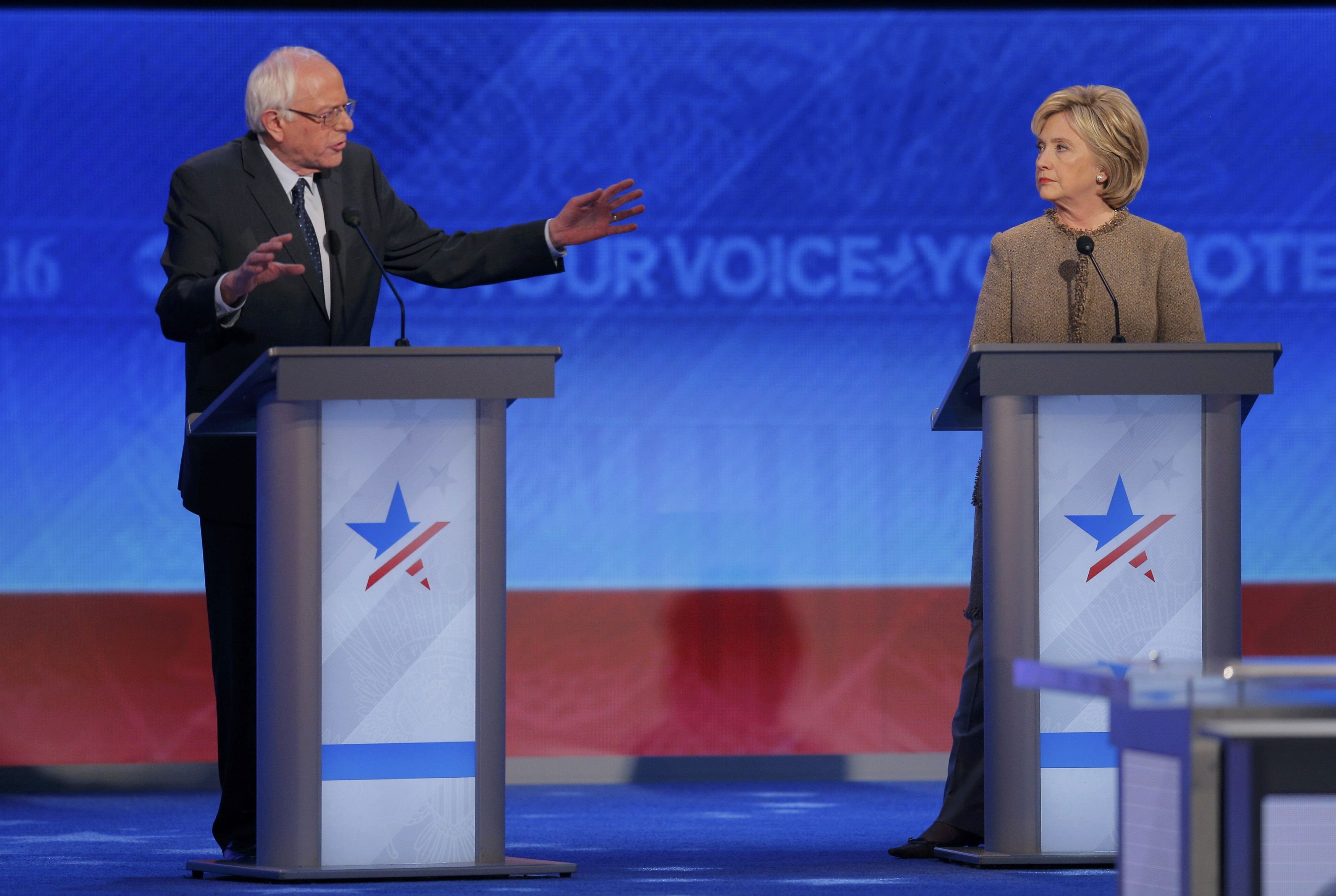 Democratic U.S. presidential candidate Senator Sanders addresses former Secretary of State Clinton about the campaign data breach scandal during the Democratic presidential candidates debate at St. Anselm College in Manchester