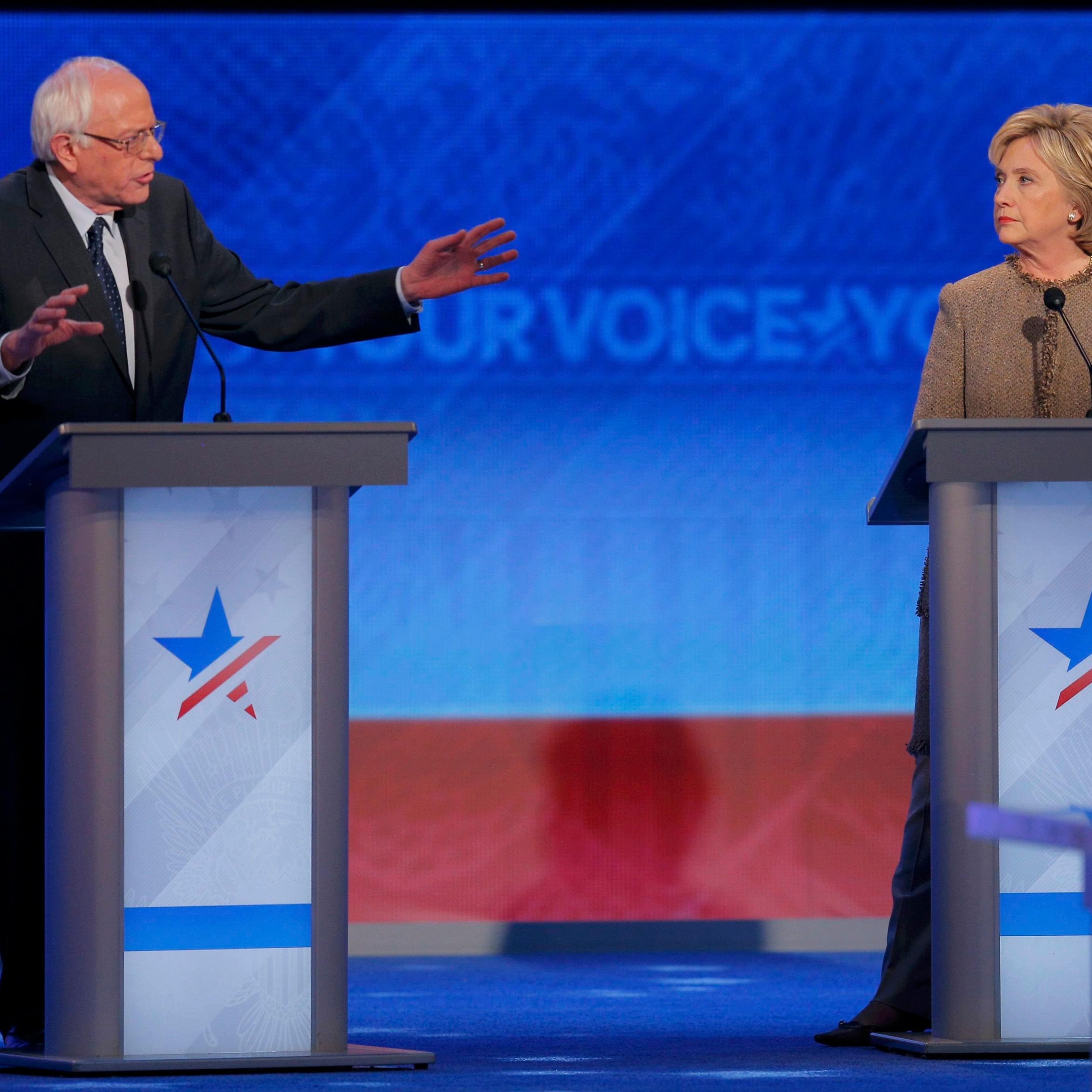 Democratic U.S. presidential candidate Senator Sanders addresses former Secretary of State Clinton about the campaign data breach scandal during the Democratic presidential candidates debate at St. Anselm College in Manchester