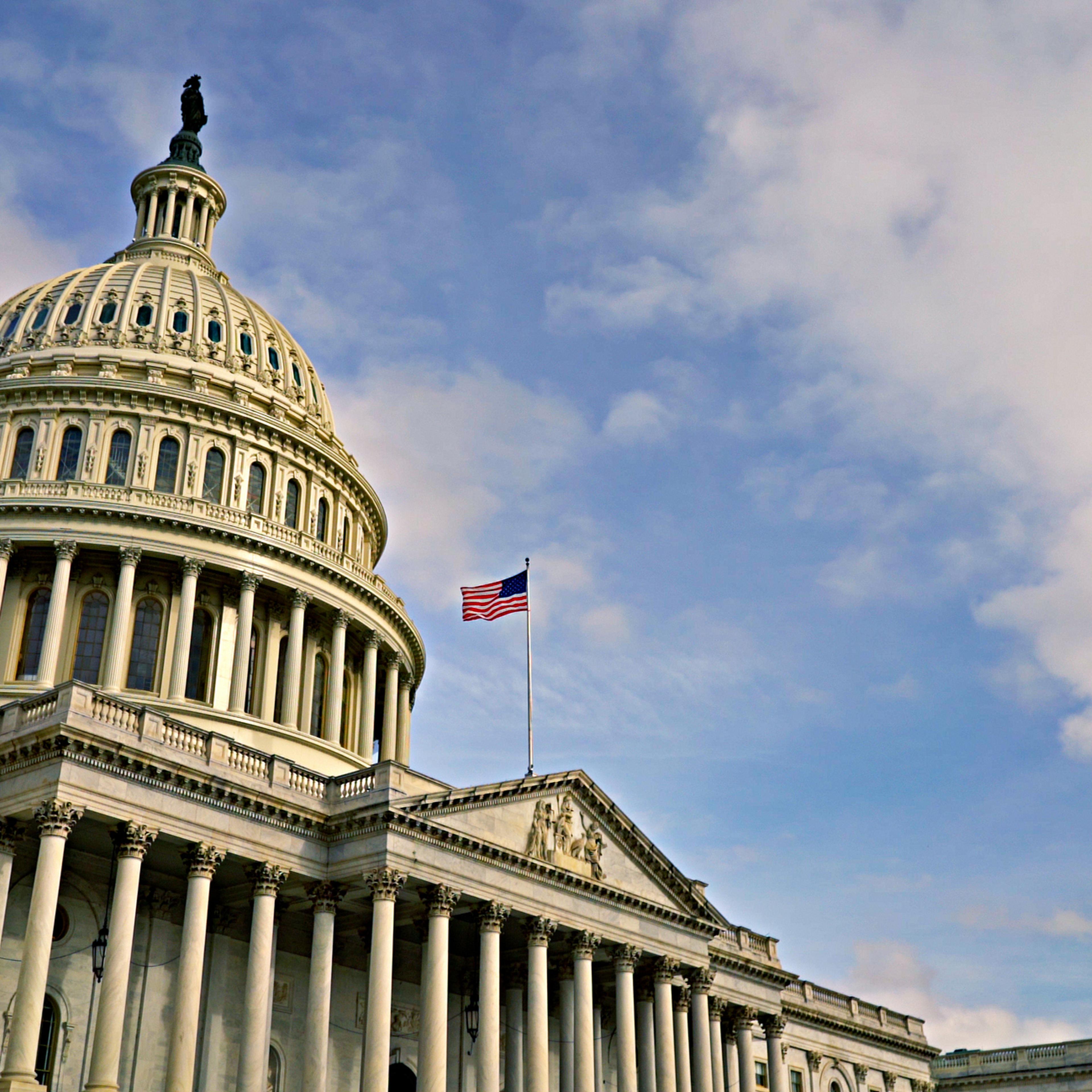 United States Capitol. Day. Flag.