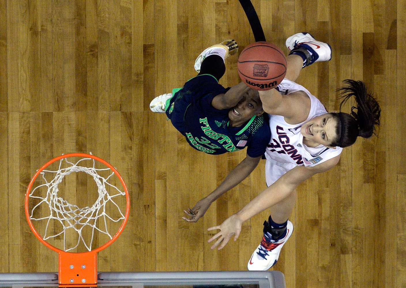 NCAA Connecticut Huskies center Stefanie Dolson shoots against Notre Dame Fighting Irish guard Jewell Loyd during the second half of the championship game of the Final Four in the 2014 NCAA Womens Division I Championship tournament at Bridgestone Arena, 