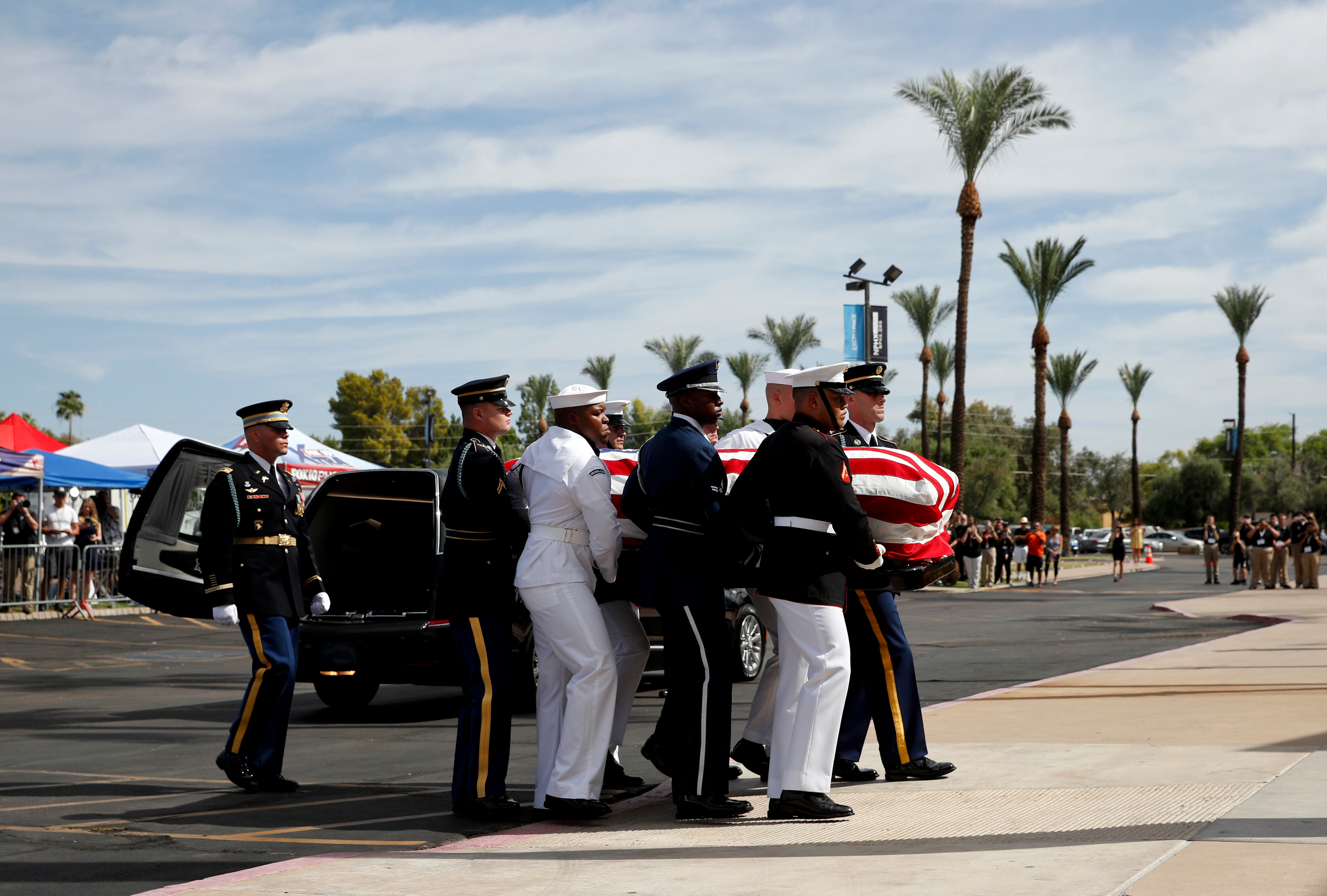 McCain's casket is carried into the church