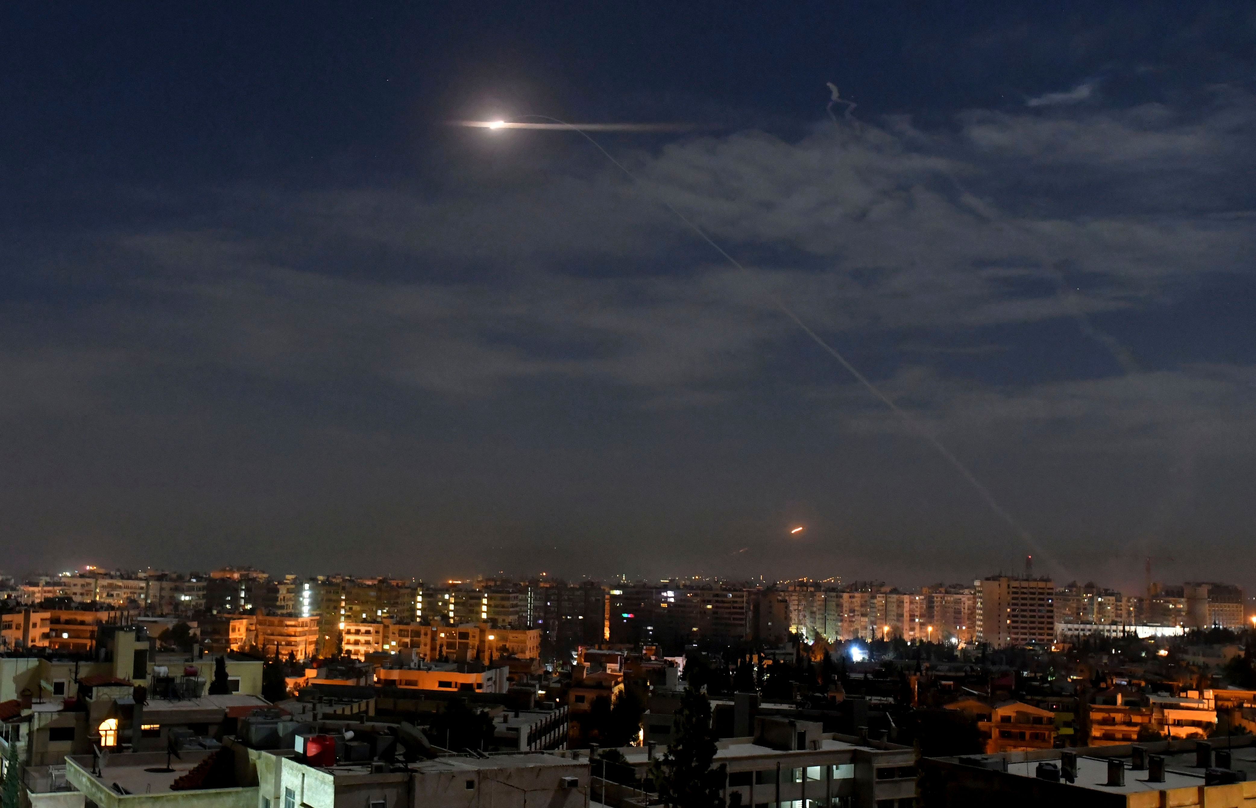Missiles flying into the sky near international airport in Damascus, Syria