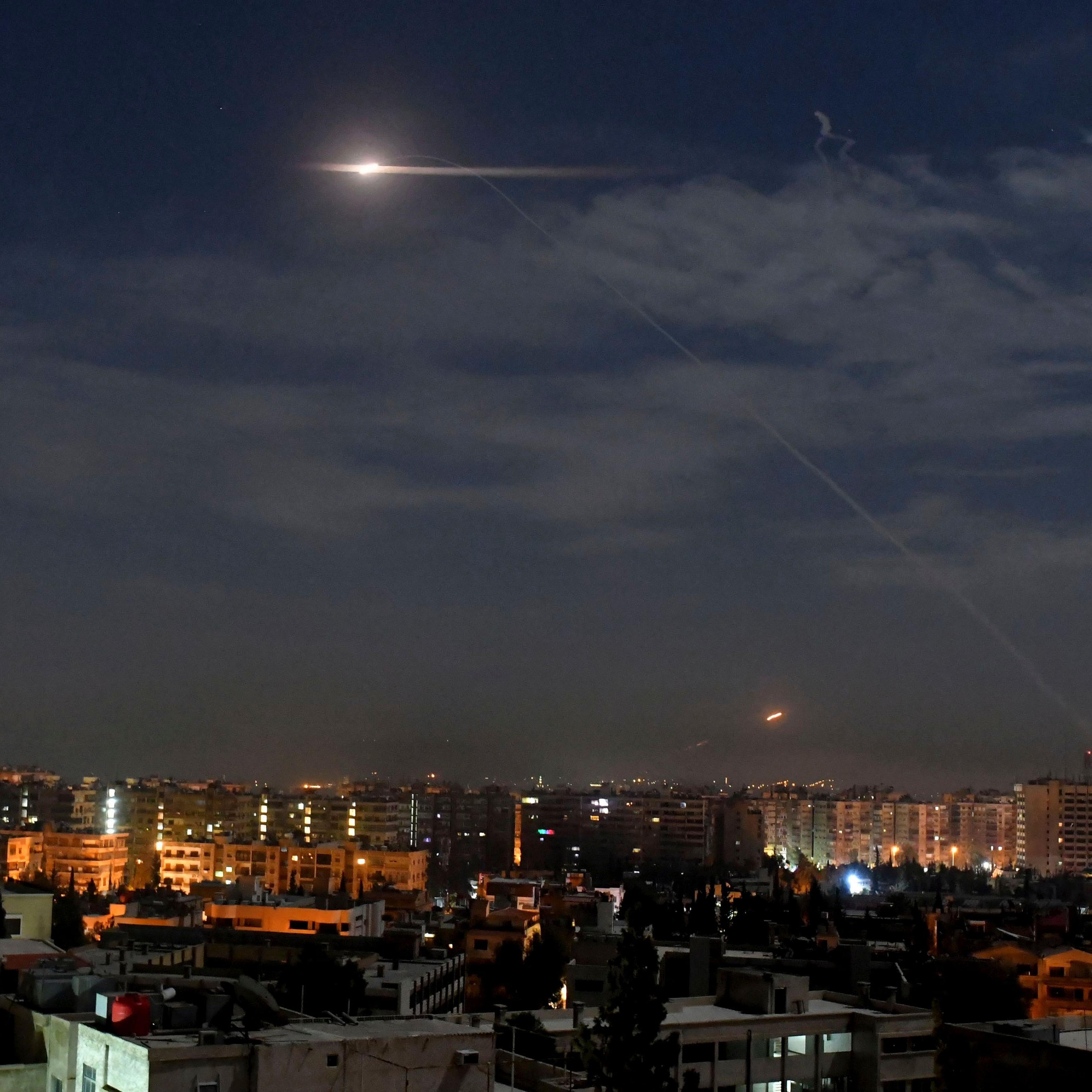 Missiles flying into the sky near international airport in Damascus, Syria
