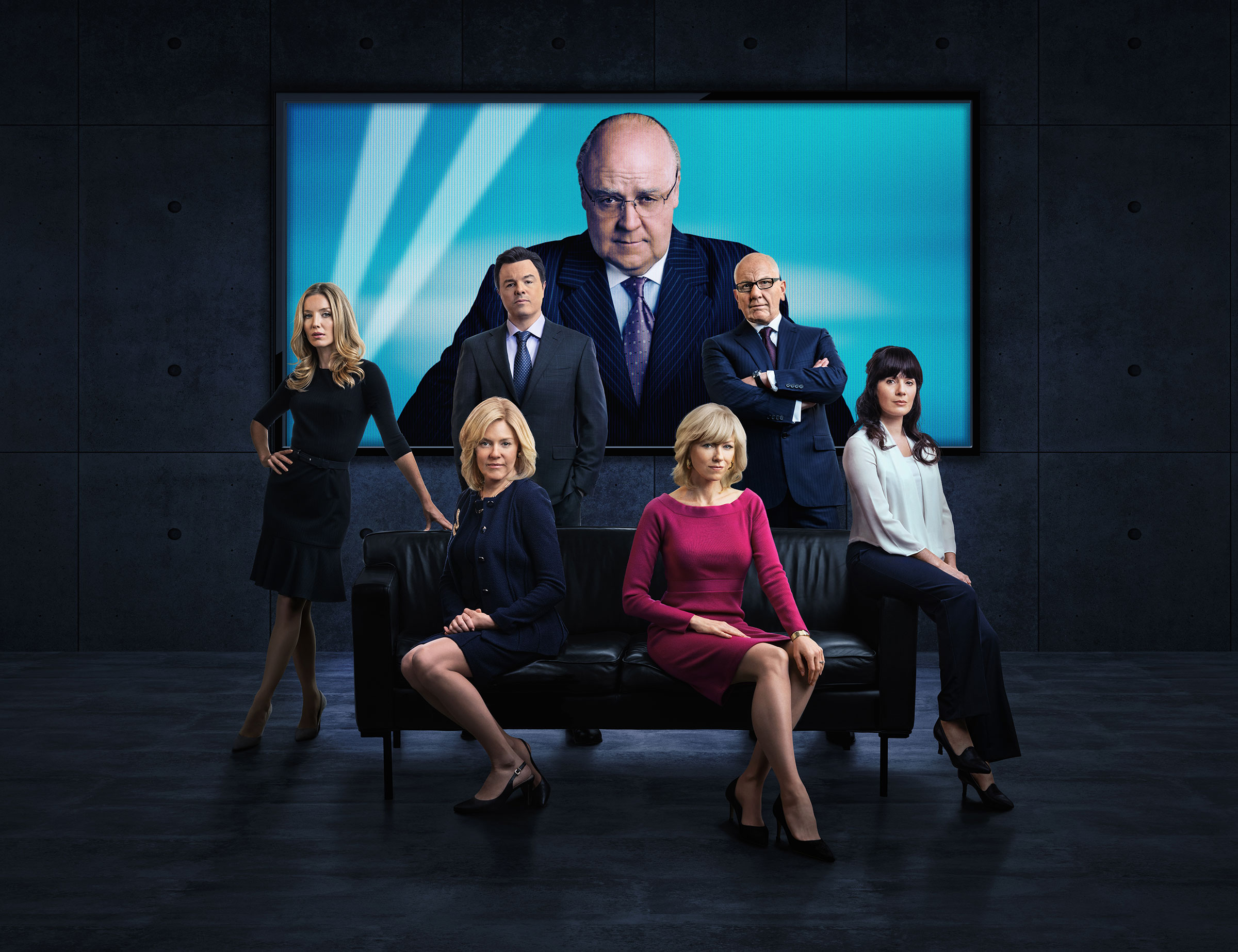 Clockwise from left: Annabelle Wallis as Laurie Luhn, Seth MacFarlane as Brian Lewis, Sienna Miller as Elizabeth Ailes, Russell Crowe as Roger Ailes, Naomi Watts as Gretchen Carlson, Simon McBurney as Rupert Murdoch and Aleksa Palladino as Judy Laterza i