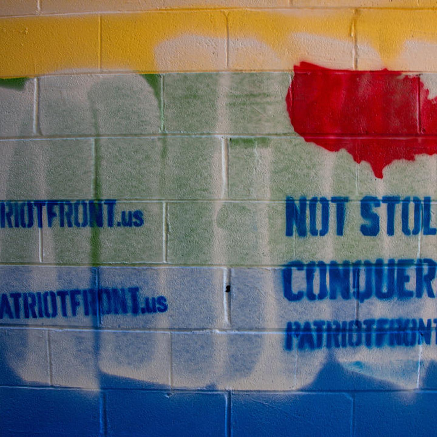 A pride mural on the outside of Jake's Card and Game shop