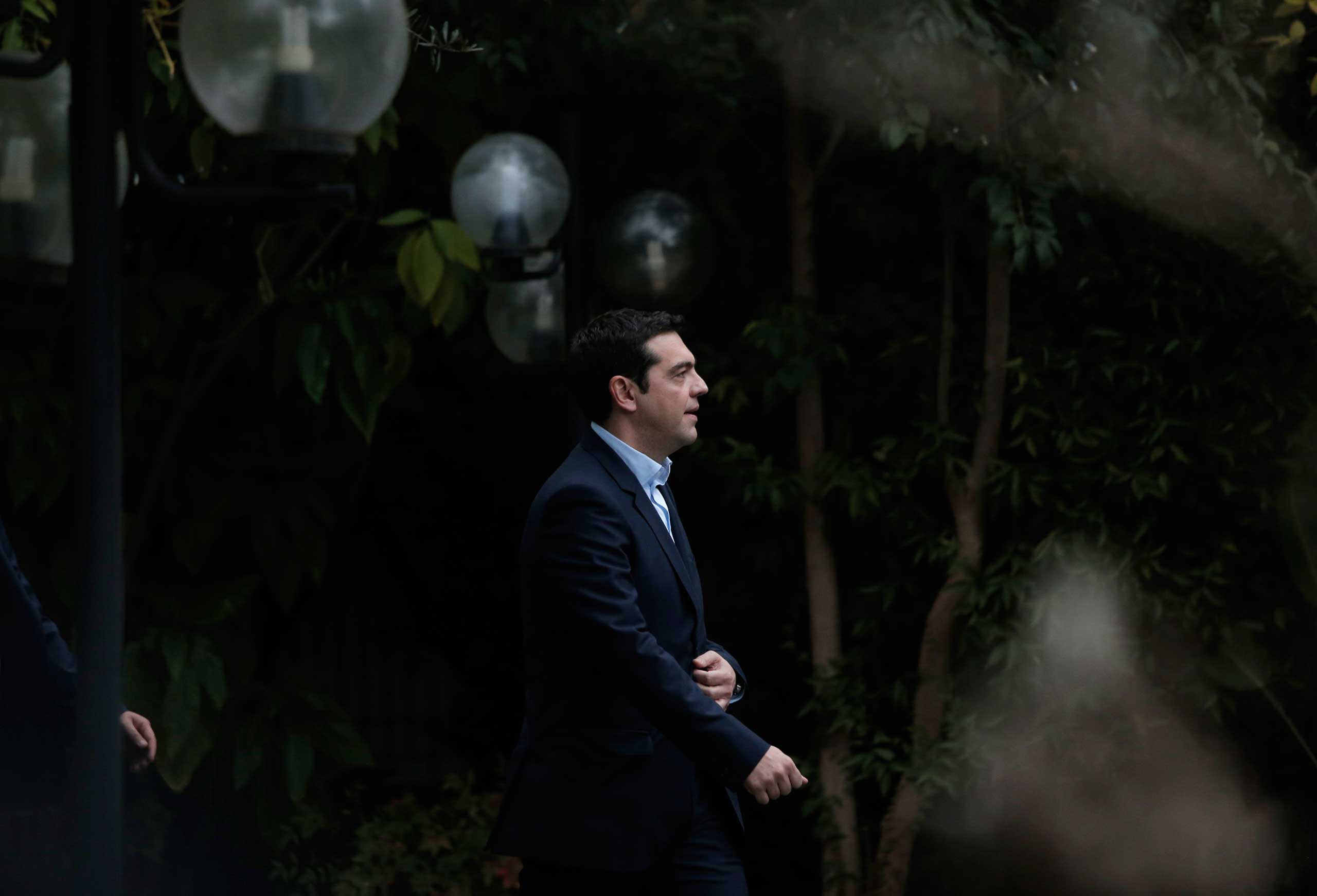 Greece's new Prime Minister Alexis Tsipras arrives at Maximos Mansion, the Greek Prime Minister's official residence in central Athens, Jan. 26, 2015.
