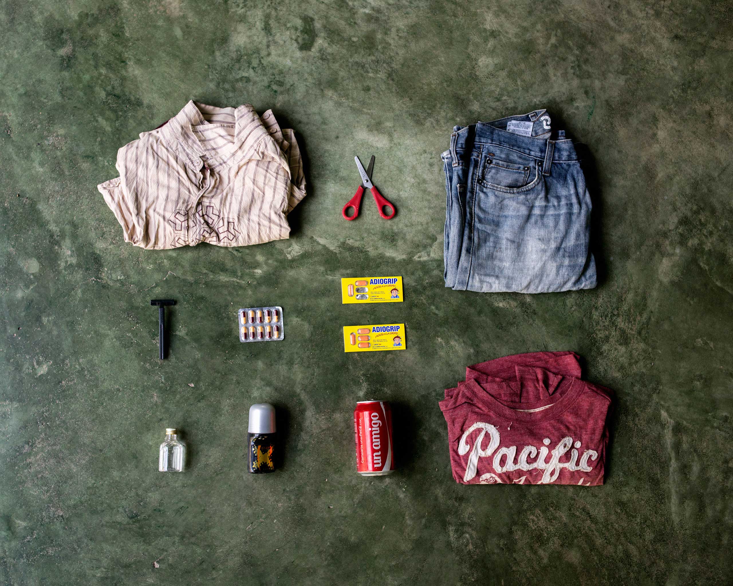 Carlos Gomez, 34, from Guatemala. He already has lived in Miami for ten years until he was deported five month ago. He tried to go back in U.S.A. but was deported again from Mexico. In his bag has a shirt, scissors, a pair of pants, razorblade, pills, sh